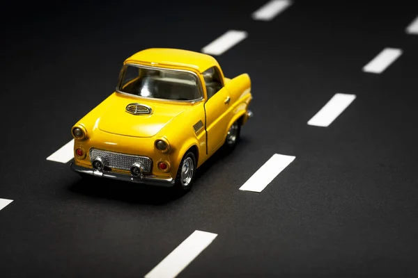 Front View Yellow Toy Car Asphalt Road — Stock Photo, Image