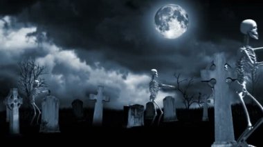 This clip shows skeletons wandering in a graveyard at night