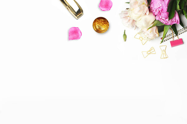 Flat lay. Flower on the table.Gold stapler. Table view. Mock-up background. Peonies. Dots polka pattern black and white. Stationery