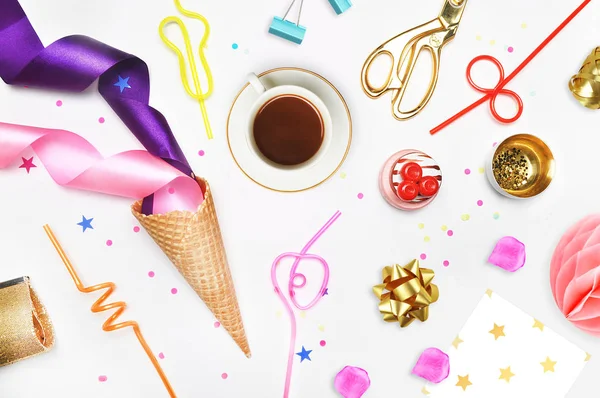 Glamour style background, flat lay. Gold and party items: Cocktail tubes apple, pear, spiral, ice cream cone, gold cosmetic bag, golden pineapple, stapler, scissors, paste. Desktop. view table, up. — Stock Image Glamour style background, flat lay. Gold and party items: Cocktail tubes apple, pear, spiral, ice cream cone, gold cosmetic bag, golden pineapple, stapler, scissors, paste. Desktop. view table, up. Stock Photo