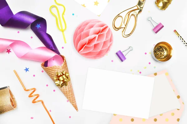 Glamour style background, flat lay. Gold and party items: Cocktail tubes apple, pear, spiral, ice cream cone, gold cosmetic bag, golden pineapple, stapler, scissors, paste. Desktop. view table, up. — Stock Photo, Image