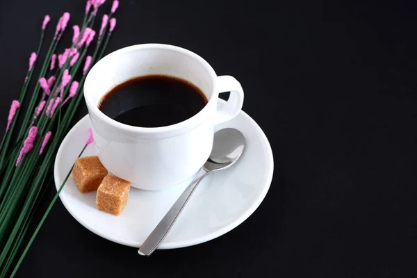 Set Mug Teaspoon Saucer Two Pieces Sugar Black Background Flowers — Stock Photo, Image