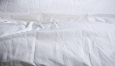 Battaniyenin beyaz dokusu. Güzel reklam arka planı. Minimalizm. Sıcaklık
