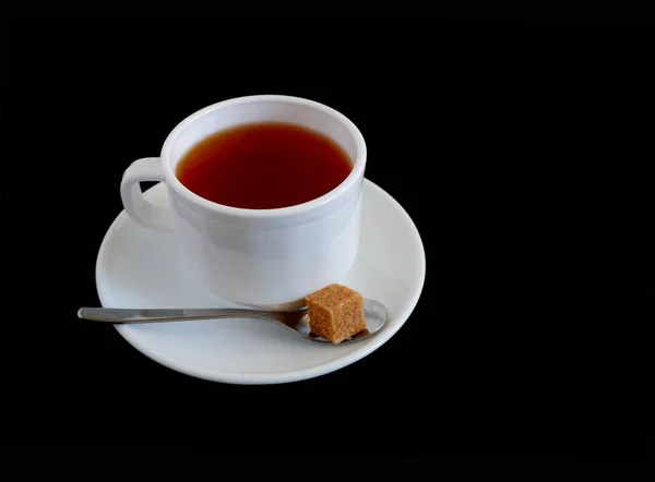 Hierbas Trozos Azúcar Morena Una Taza Blanca Sobre Fondo Negro —  Fotos de Stock