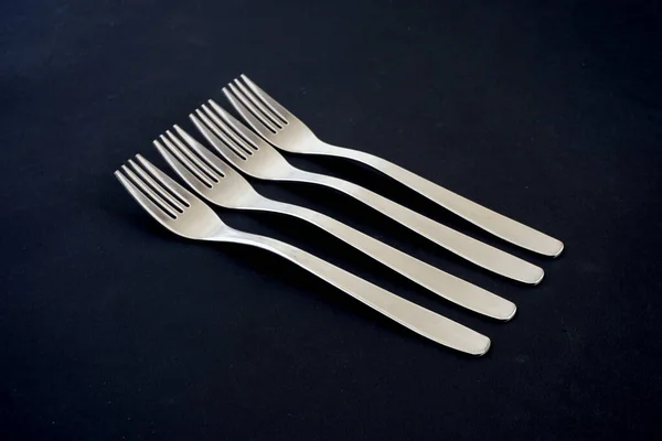 Tenedores Metal Sobre Fondo Negro Adecuado Para Maquetas Electrodomésticos Cocina —  Fotos de Stock