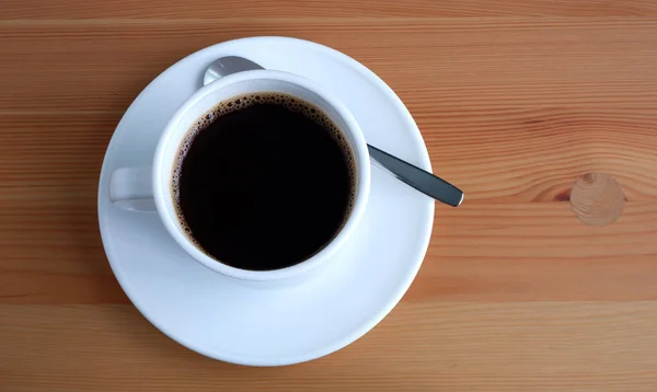 Eine Tasse Kaffee Auf Einem Holztisch Geeignet Für Werbehintergründe Und — Stockfoto