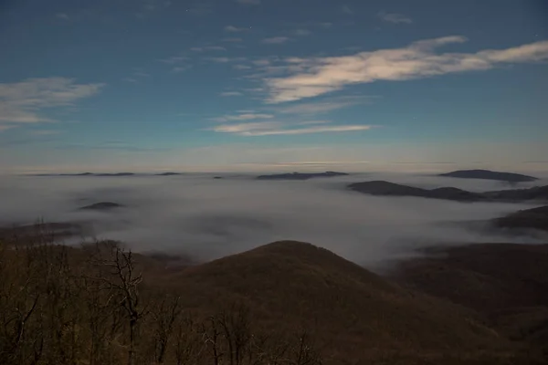 Inverse Clouds Lie Valleys Mountains Moonlight — Stockfoto