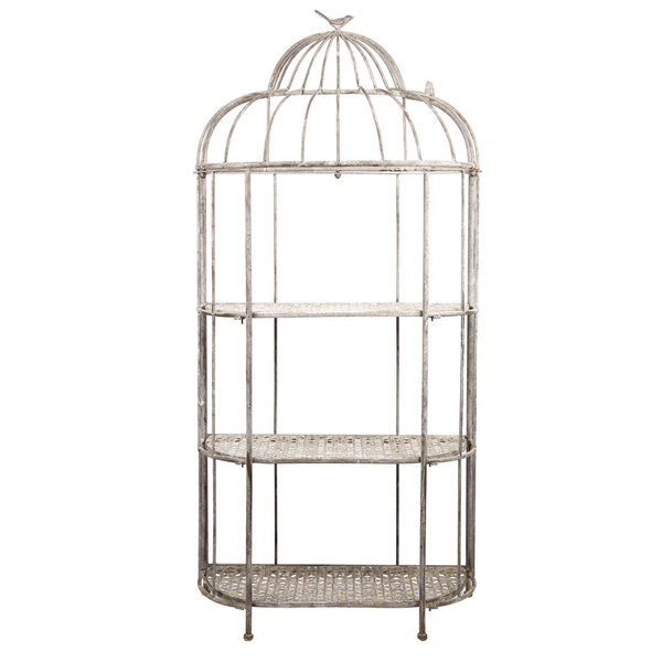 white metal shelving in the form of a cage