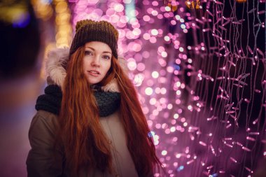  redhair girl in warm hat 