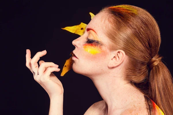 Woman with colors of German flag — Stock Photo, Image