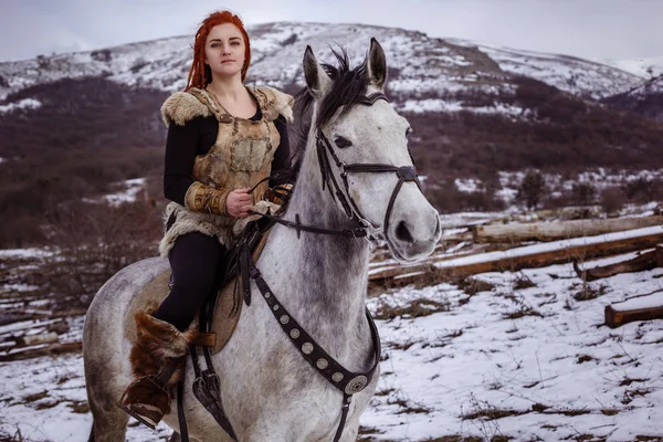 Viking woman with gray horse — Stock Photo, Image