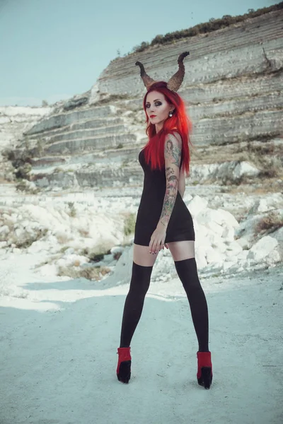 Woman with red hair and devil horns — Stock Photo, Image