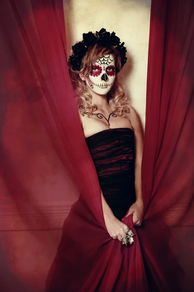 attractive woman with skull makeup