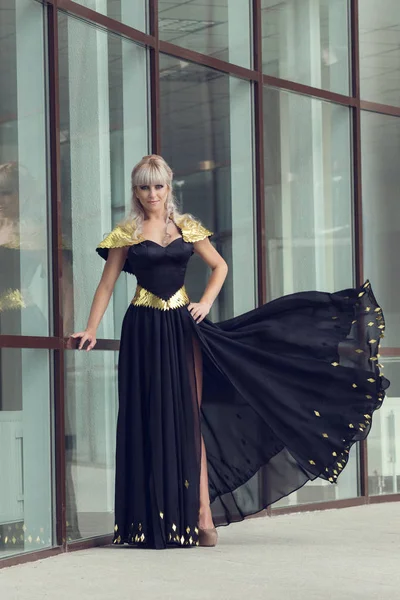 Joyful woman in black dress — Stock Photo, Image