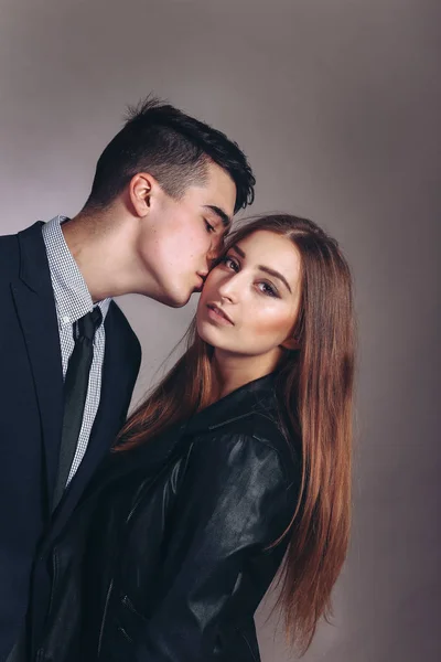 Young man hugging his girlfriend — Stock Photo, Image