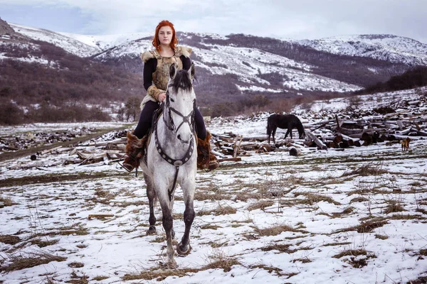 Viking woman with gray horse — Stock Photo, Image