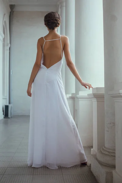 Woman posing in long dress — Stock Photo, Image