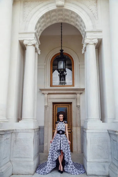 Woman posing in long dress — Stock Photo, Image