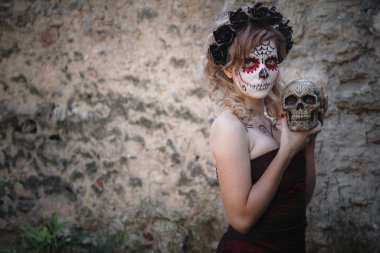 Closeup portrait of Calavera Catrina. young woman