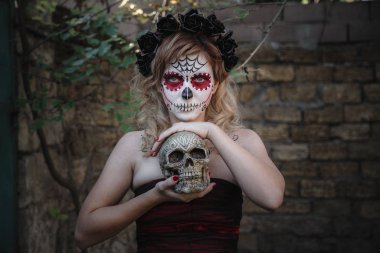 Closeup portrait of Calavera Catrina. young woman