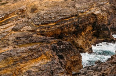 Portekiz, Lagos yakınlarındaki Algarve 'nin batı kıyısındaki vahşi ve keşfedilmemiş plajlar ve uçurumlar..