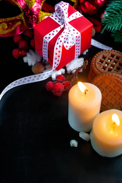 Christmas decorations candles and gifts — Stock Photo, Image