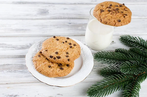 Glass of milk and cookies with chocolate for Santa — Stock Photo, Image