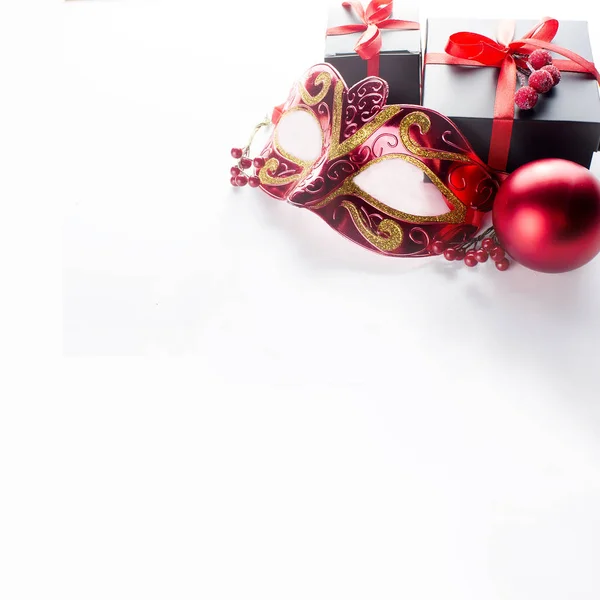 Black christmas  gift  box with red ribbon and nask