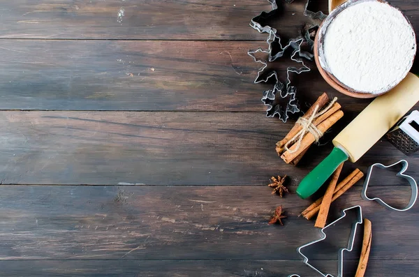 Cutting the gingerbread cookie dough for Christmas and New Year — Stock Photo, Image