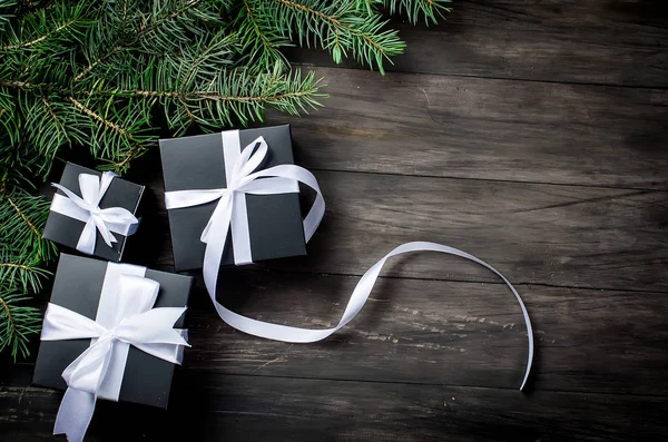 Black christmas  gift  box and white ribbon