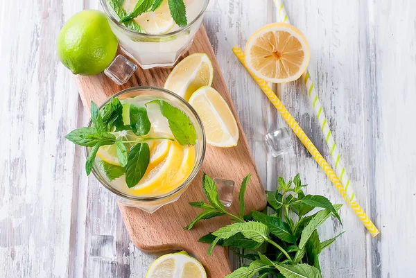 Lemonade in glass with ice and mint — Stock Photo, Image