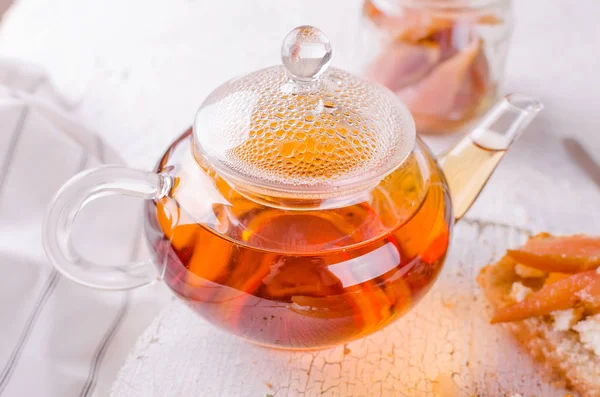 Glass teapot with hot tea — Stock Photo, Image