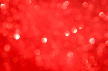 Kırmızı bokeh. Kopya alanı ile birlikte tatil özeti arkaplanı. Yumuşak, bulanık, kırmızı, sönmüş ışıklar. Şenlik dokusu.