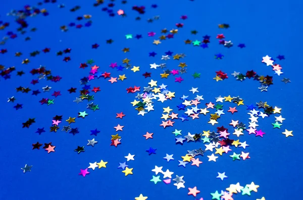 Shining Little Colorful Stars Blue Background Top View Copy Space — Stock Photo, Image