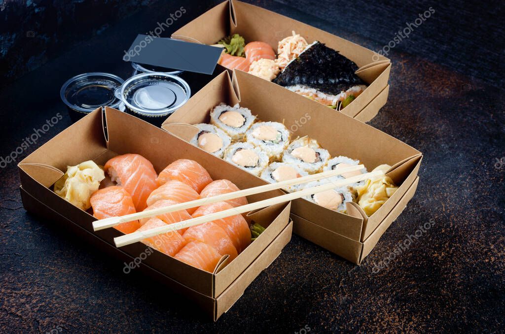 Download Tasty Sushi Rolls In Disposable Kraft Paper Boxes Sauces On Dark Table Concept Delivery Service Japan Food In Eco Container Flat Lay Template Mockup With Place For Text Zero Waste Packaging 375343618