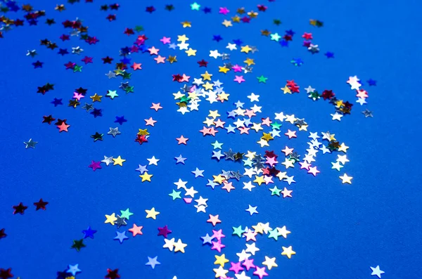 Shining Little Colorful Stars Blue Background Top View Copy Space — Stock Photo, Image