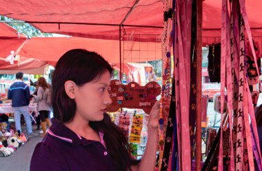 Woman buying some vegetables and fruits