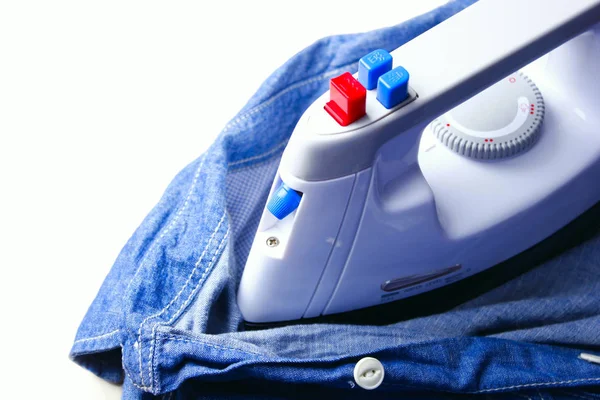 White iron on denim shirt on white background close-up — Stock Photo, Image