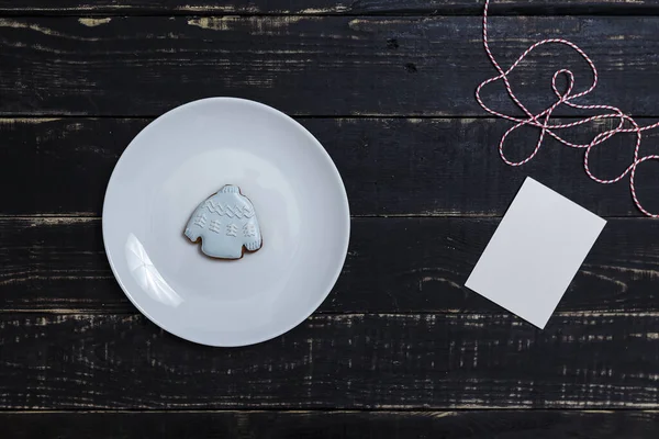 Sweater Shape Gingerbread Cookie White Plate Standing Black Wooden Table — Stock Photo, Image