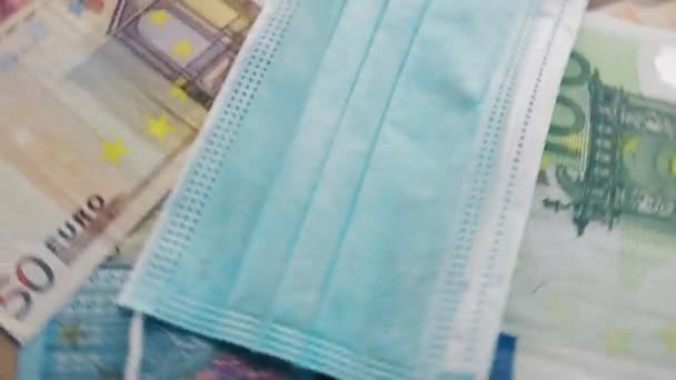 Billetes Euros Giratorios Máscara Gasa Covid Pandemia Crisis Económica Impago — Vídeos de Stock