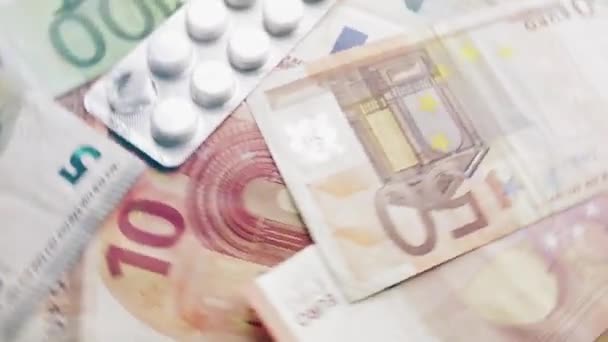 Billetes Euros Giratorios Medicamentos Covid Pandemia Crisis Económica Impago Salud — Vídeo de stock