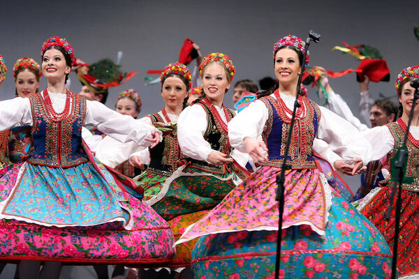 New York City, NY - December 11, 2010: National dance troupe of Poland - Mazowsze. Event, costume. The Magnificent MAZOWSZE 60th Anniversary Tour in USA, Spectacle with dancers on stage.