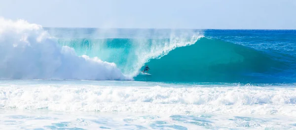 OAHU, HI - December 14, 2013: World Champion Surfer, Kelly Slater, surfing in the Billabong Pipeline Masters Surf Contest on the North Shore of Hawaii. Part of the 2013 Triple Crown of Surfing Competition.