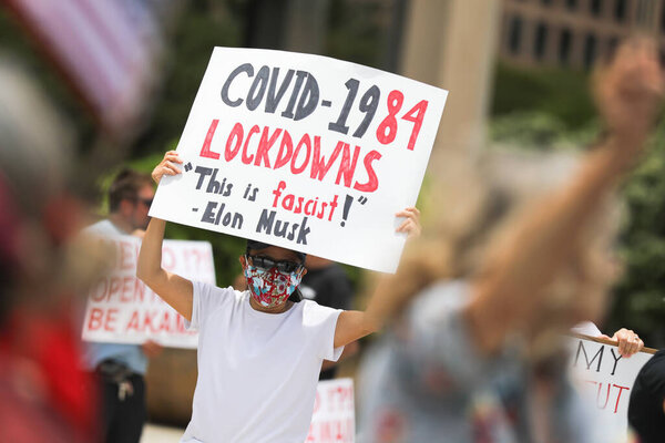 HONOLULU HAWAII: May 1st, 2020: ReOpen Hawaii Rally, Protests to reopen businesses during Coronavirus COVID-19 shutdowns at the Hawaii State Capitol
