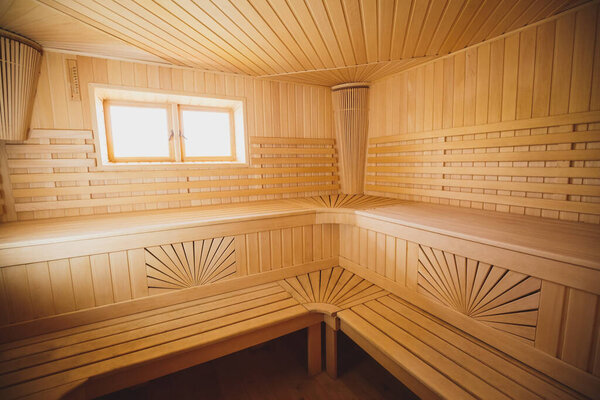 Sauna of the big size. The light spacious bathroom trimmed with natural wood