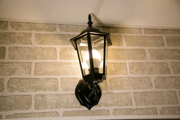 Stylish Metal Lamp Hanging Brick Wall Stock Picture