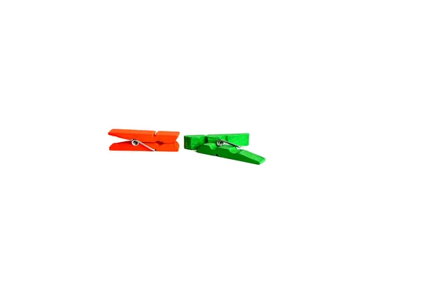 Two Clothes Pegs Orange Green White Background — Stock Photo, Image