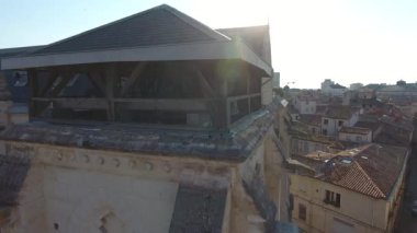 aerial flight around saint roch church bell tower in montpellier france
