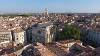 aerial flight around saint roch church early morning in montpellier france ecusson city center