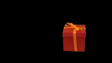 red gift box with yellow gold ribbon bow dolly in track in zoom in at transparent background alpha channel chroma key transparent background have empty space for text soft focus lr pan